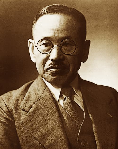 Koichi Kawai, founder of Kawai pianos, demonstrating Japanese piano craftsmanship and traditional piano making techniques